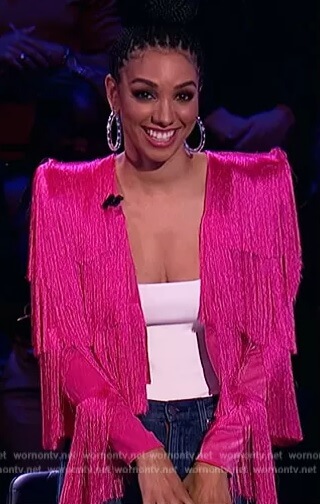 Corine's pink fringe jacket on Beat Shazam