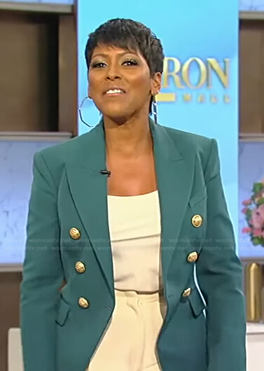 Tamron's green blazer with gold buttons on Tamron Hall Show