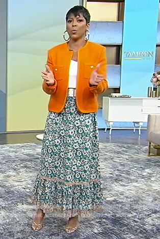 Tamron’s orange jacket and floral skirt on Tamron Hall Show