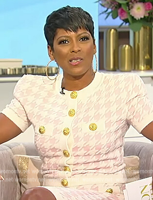 Tamron's pink houndstooth top and skirt on Tamron Hall Show