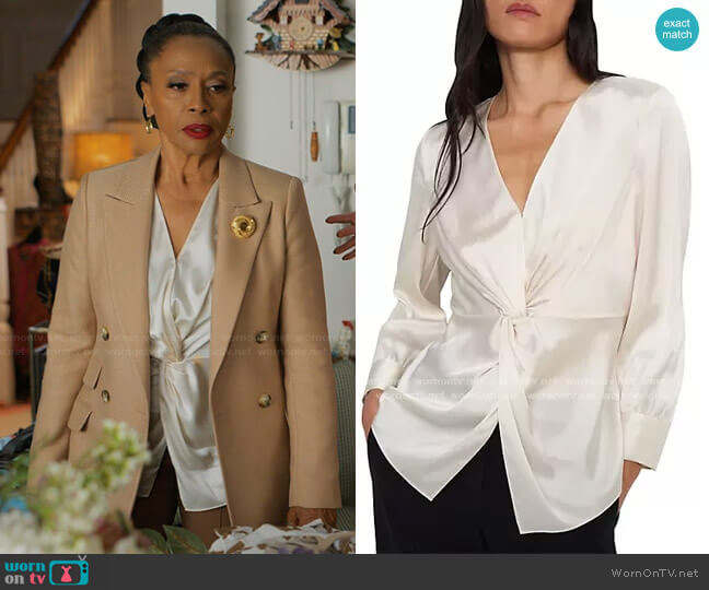 Patricia’s white twist front blouse on I Love That For You
