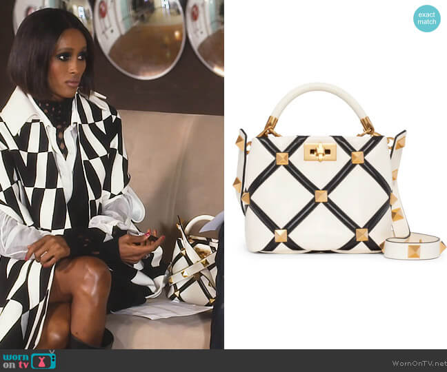Small Roman Stud Grid Leather Top Handle Bag by Valentino worn by Chanel Ayan (Chanel Ayan) on The Real Housewives of Dubai
