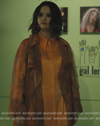 Mabel’s sheer trench coat and satin shirtdress on Only Murders in the Building