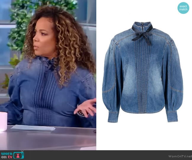 Rhythmic tie-detailed denim shirt by Zimmermann worn by Sunny Hostin on The View