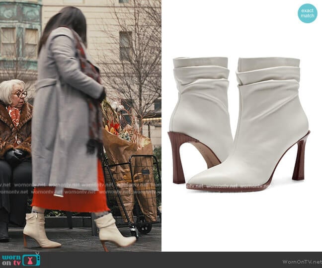 Presindal Pointy Toe Boots by Vince Camuto worn by Christine Ko on Only Murders in the Building