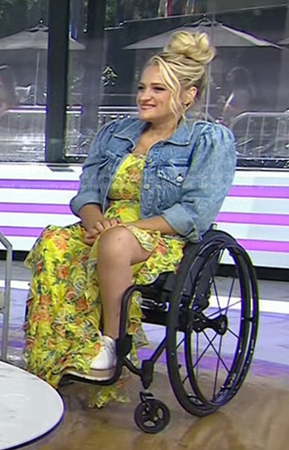 Ali Stroker’s yellow floral dress and denim jacket on Today