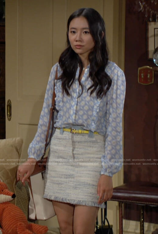 Allie’s blue printed top and tweed skirt on The Young and the Restless