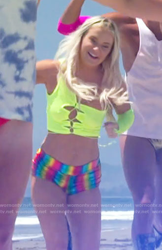 Deb’s neon green top and rainbow booty shorts on Love Island USA