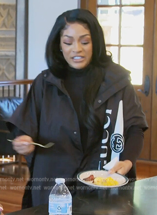 Drew's black Gucci rain jacket on The Real Housewives of Atlanta