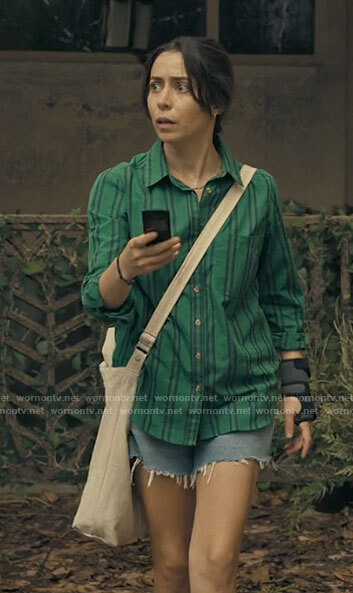 Emma’s green striped button down shirt on The Resort