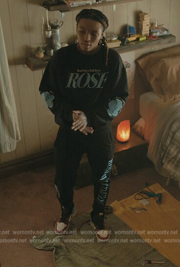 Jake’s navy Rose graphic sweatshirt and pants on The Chi