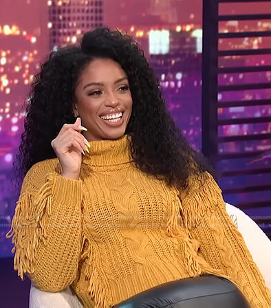Francesca Amiker's yellow fringed sweater on E! News Nightly Pop