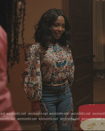 Jemma's white printed blouse and paisley embroidered jeans on The Chi