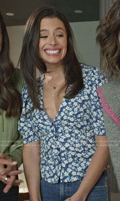 Jessie's blue floral v-neck top on Maggie