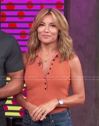 Kit’s orange ribbed sleeveless top on Access Hollywood