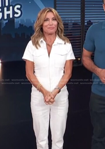 Kit’s white zip jumpsuit on Access Hollywood