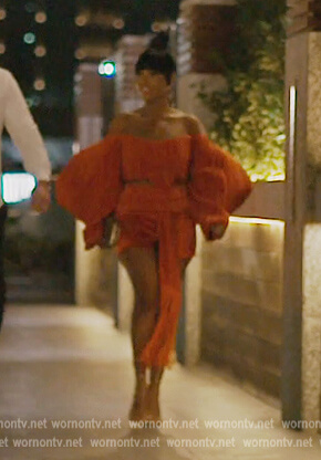 Lesa’s orange off shoulder top and skirt on The Real Housewives of Dubai