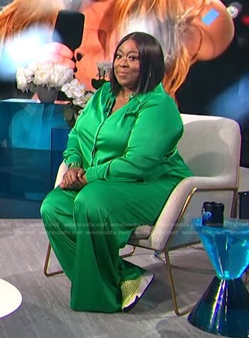 Loni’s green satin blouse and pants on E! News Daily Pop