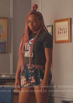 Phoebe’s floral shorts and The Who graphic tee on Everythings Trash
