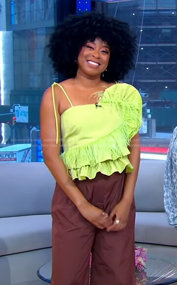 Phoebe Robinson’s yellow ruffled feather trim top and brown pants on Good Morning America
