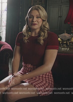 Polly’s red ribbed sweater and check skirt on Riverdale