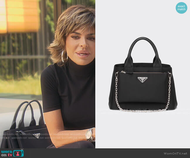 Lisa Rinna and Her Courreges Patent Clutch Bag - PurseBlog