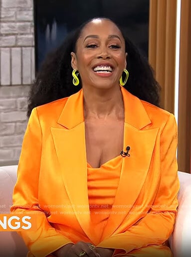Simone Missick's orange mini dress and blazer on CBS Mornings