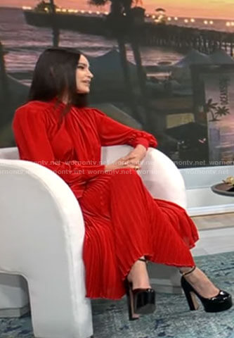 Sofia Carson's red pleated dress and black patent platforms on CBS Mornings
