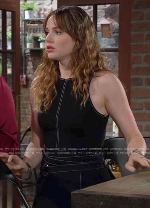 Tessa’s black dress with white stitching on The Young and the Restless