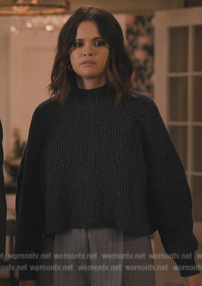Mabel's navy mock neck sweater on Only Murders in the Building