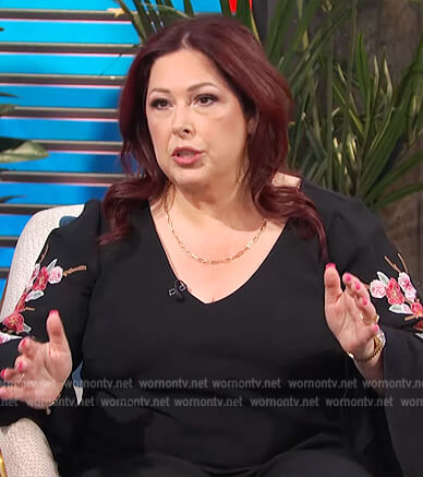 Carnie Wilson’s black floral embroidered dress on E! News Daily Pop