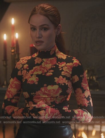 Cheryl's black floral print top with gloves on Riverdale