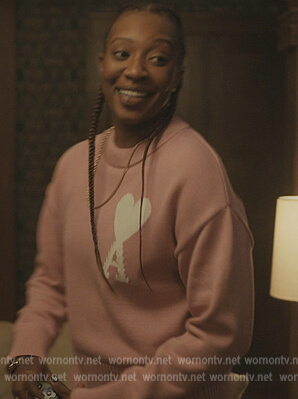 Dre's pink heart sweatshirt on The Chi