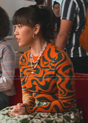 Eleanor’s orange and green heart print sweater on Never Have I Ever