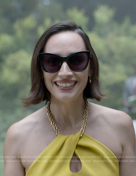 Dr Perle’s yellow chain halter neck dress and sunglasses on American Horror Stories