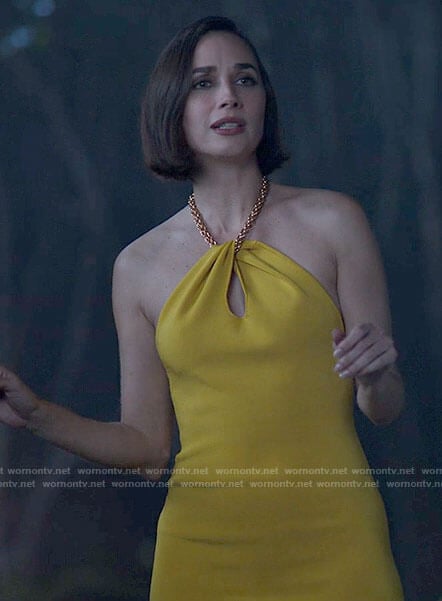 Dr Perle’s yellow chain halter neck dress and sunglasses on American Horror Stories