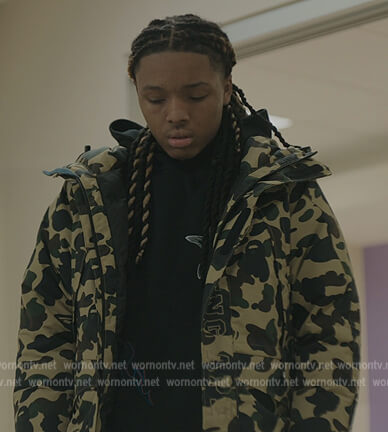 Jake’s camo print puffer jacket on The Chi