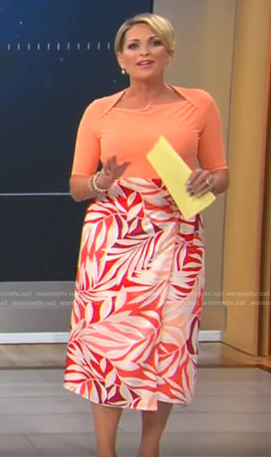 Jamie Yuccas’s orange top and leaf print skirt on CBS Mornings