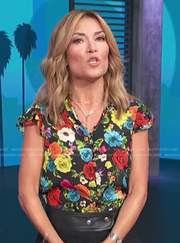 Kit’s black floral blouse on Access Hollywood