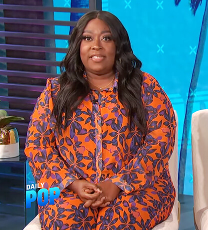 Loni's orange floral top and pants on E! News Daily Pop