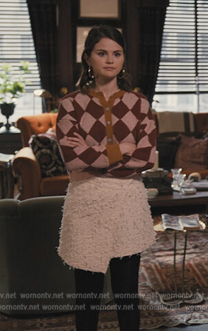 Mabel's argyle cardigan and tweed mini skirt on Only Murders in the Building