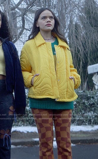 Mouse’s green graphic sweater, yellow quilted jacket, and orange check pants on Pretty Little Liars Original Sin