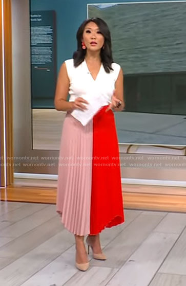 Nancy Chen’s pink and red pleated skirt on CBS Mornings