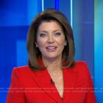 Norah’s red peplum blazer on CBS Evening News