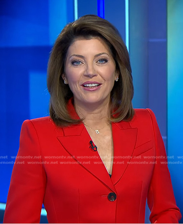 Norah’s red peplum blazer on CBS Evening News