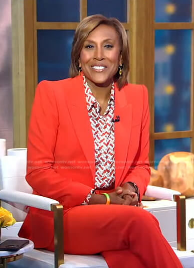 Robin's print blouse and orange blazer on Good Morning America