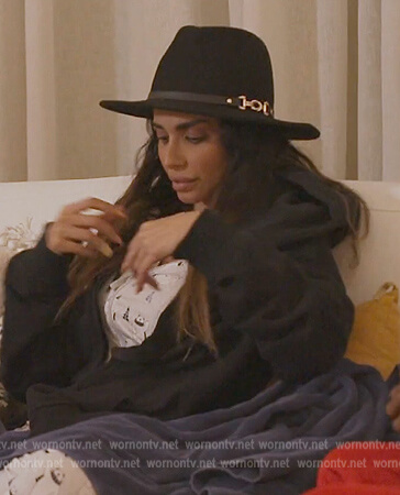 Sara’s black buckle detail hat on The Real Housewives of Dubai