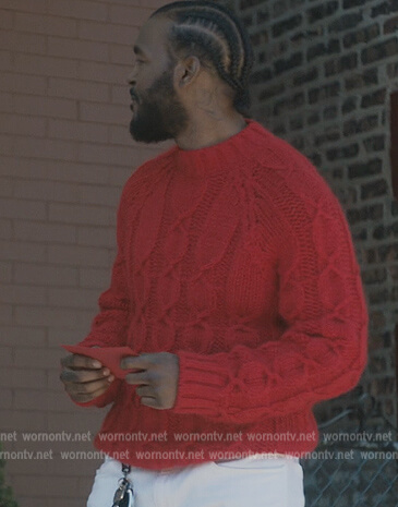 Trig’s red cable knit sweater on The Chi