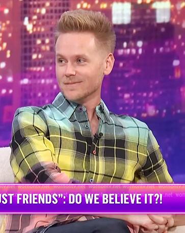 Zach Noe Towers’ rainbow plaid shirt on E! News Nightly Pop