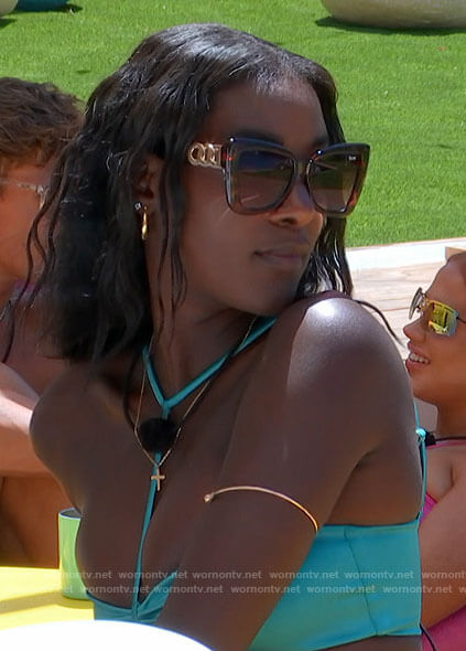 Zeta's blue t-strap bikini and tortoiseshell cat eye sunglasses on Love Island USA